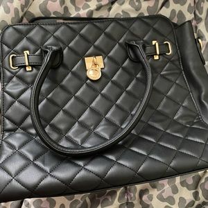 A large black shoulder bag